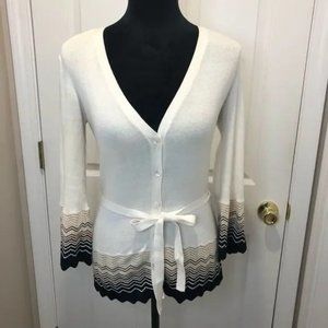 Trina Turk cream cardigan scalloped hem sweater.
